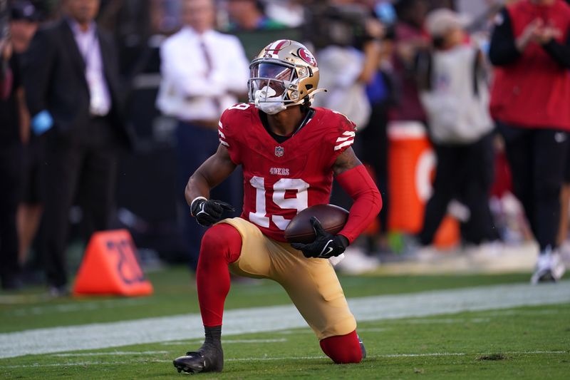 Oct 20, 2024; Santa Clara, California, USA; San Francisco 49ers wide receiver Jacob Cowing (19) reacts after making a catch for a first down against the Kansas City Chiefs in the fourth quarter at Levi's Stadium. Mandatory Credit: Cary Edmondson-Imagn Images