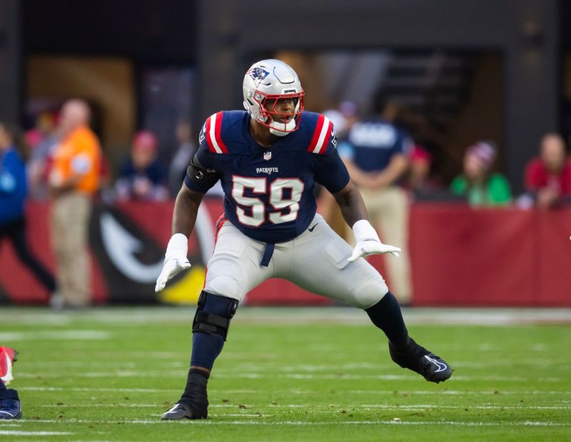 Dec 15, 2024; Glendale, Arizona, USA; New England Patriots offensive tackle Vederian Lowe (59) against the Arizona Cardinals at State Farm Stadium. Mandatory Credit: Mark J. Rebilas-Imagn Images
