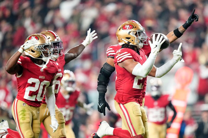 Nov 24, 2025; Santa Clara, California, USA; San Francisco 49ers safety Ji'Ayir Brown (27) reacts after an interception against the Carolina Panthers during the first half at Levi's Stadium. Mandatory Credit: Kyle Terada-Imagn Images