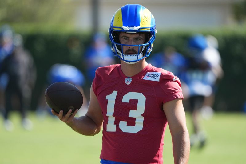 Jul 27, 2026; Westchester, CA, USA; Los Angeles Rams quarterback Stetson Bennett IV (13) during training camp  at Loyola Marymount University. Mandatory Credit: Kirby Lee-Imagn Images