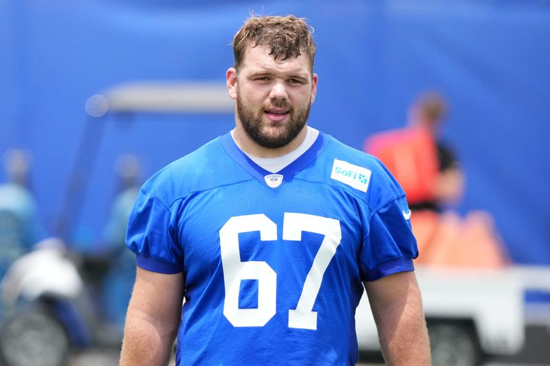 Jun 3, 2025; Woodland Hills, CA, USA; Los Angeles Rams lineman Justin Dedich (67) during organized team activities at Rams Practice Facility. Mandatory Credit: Kirby Lee-Imagn Images