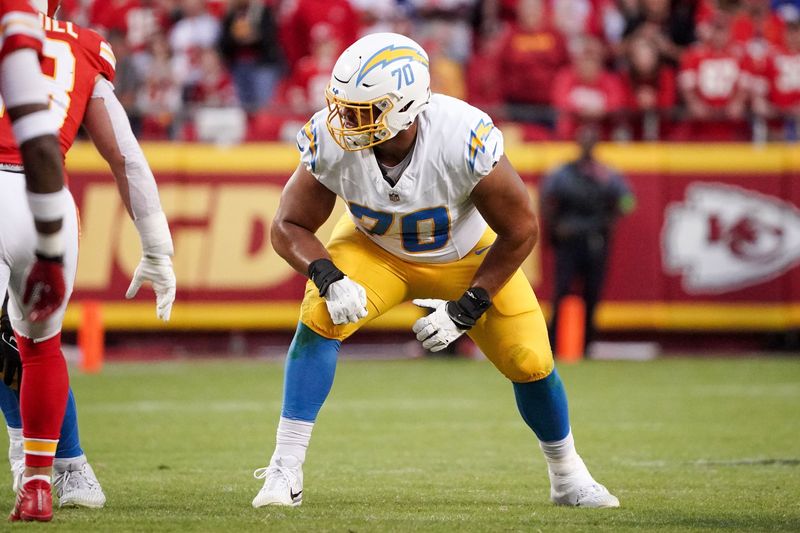 Oct 12, 2023; Kansas City, Missouri, USA; Los Angeles Chargers offensive tackle Rashawn Slater (70) lines up against the Kansas City Chiefs during the game at GEHA Field at Arrowhead Stadium. Mandatory Credit: Denny Medley-USA TODAY Sports