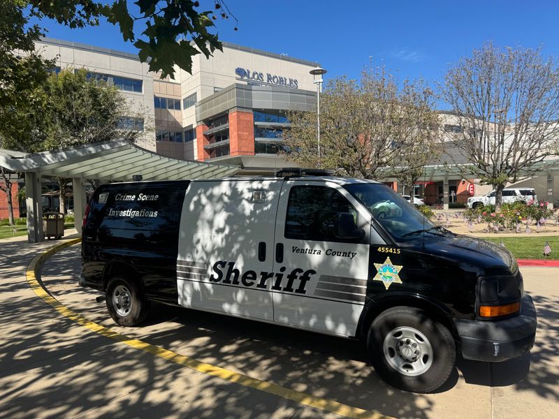A Ventura County Sheriff's Office van sits outside Los Robles Regional Medical Center July 2, after a Simi Valley police officer shot a man in the Thousand Oaks hospital.