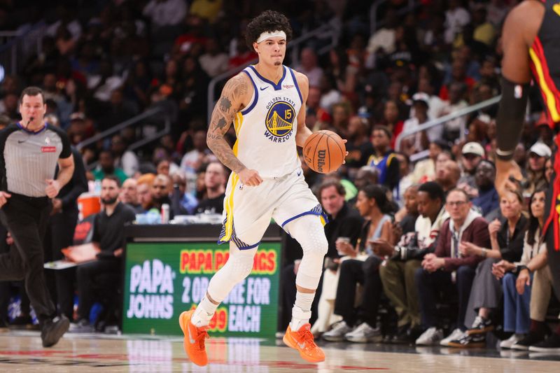 Mar 21, 2026; Atlanta, Georgia, USA; Golden State Warriors forward Gui Santos (15) dribbles against the Atlanta Hawks in the fourth quarter at State Farm Arena. Mandatory Credit: Brett Davis-Imagn Images