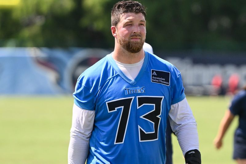 Jul 23, 2025; Nashville, TN, USA;  Tennessee Titans offensive lineman Blake Hance (73) walks off the field during training camp at Ascension Saint Thomas Sports Park. Mandatory Credit: Steve Roberts-Imagn Images