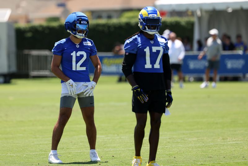 Jul 29, 2026; Los Angeles, CA, USA;  Los Angeles Rams  wide receiver Puka Nacua (12) stands next to wide receiver Davante Adams (17) during training camp at Loyola Marymount University. Mandatory Credit: Kiyoshi Mio-Imagn Images