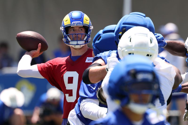 Jul 29, 2026; Los Angeles, CA, USA;  Los Angeles Rams  quarterback Matthew Stafford (9) throws a pass during training camp at Loyola Marymount University. Mandatory Credit: Kiyoshi Mio-Imagn Images
