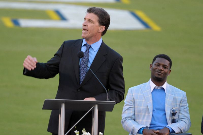 May 10, 2012; San Diego, CA, USA; San Diego Chargers former linebacker Billy Ray Smith speaks as LaDainian Tomlinson listens at the Celebration of Life for Junior Seau at Qualcomm Stadium. Mandatory Credit: Kirby Lee/Image of Sport-USA TODAY Sports