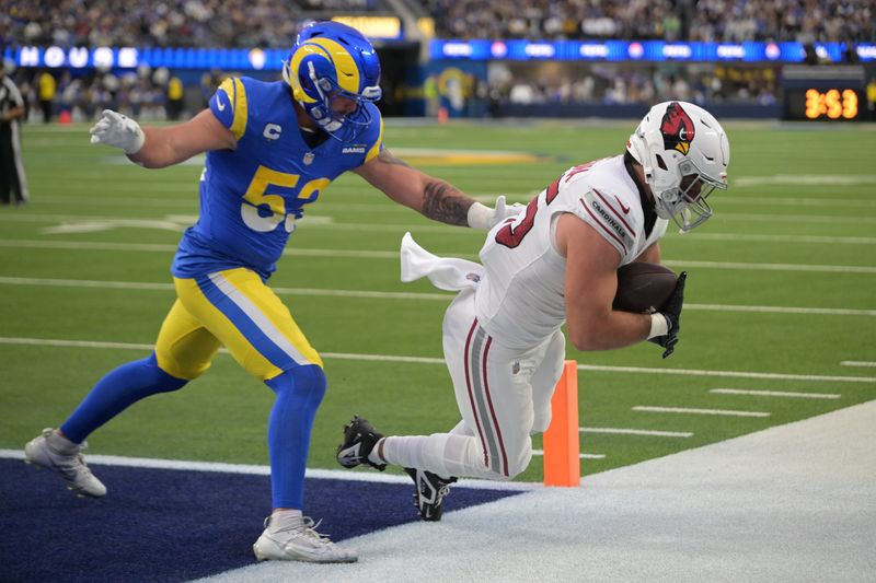 Jan 4, 2026; Inglewood, California, USA;  Arizona Cardinals tight end Josiah Deguara (45) catches a touchdown in front of Los Angeles Rams linebacker Nate Landman (53) during the second half at SoFi Stadium. Mandatory Credit: Jayne Kamin-Oncea-Imagn Images