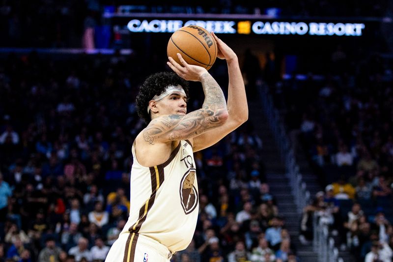 Mar 25, 2026; San Francisco, California, USA; Golden State Warriors forward Gui Santos (15) takes a three-point shot against the Brooklyn Nets during the third quarter at Chase Center. Mandatory Credit: John Hefti-Imagn Images