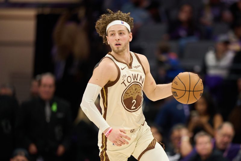 Apr 10, 2026; Sacramento, California, USA; Golden State Warriors guard Brandin Podziemski (2) brings the ball upcourt against against the Sacramento Kings during the third quarter at Golden 1 Center. Mandatory Credit: Robert Edwards-Imagn Images
