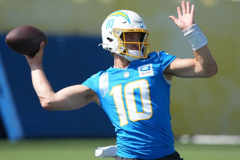 Jul 30, 2026; El Segundo, CA, USA; Los Angeles Chargers quarterback Justin Herbert (10) throws the ball at training camp at The Bolt. Mandatory Credit: Kirby Lee-Imagn Images