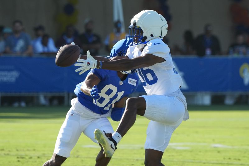 Jul 31, 2026; Westchester California USA; Los Angeles Rams defensive back Alex Johnson (36) attempts to catch a pass intended for receiver Brennan Presley (81) at training camp at Loyola Marymount University. Mandatory Credit: Kirby Lee-Imagn Images