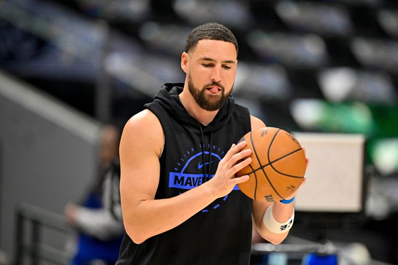 Apr 3, 2026; Dallas, Texas, USA; Dallas Mavericks guard Klay Thompson (31) warms up before the game between the Dallas Mavericks and the Orlando Magic at the American Airlines Center. Mandatory Credit: Jerome Miron-Imagn Images