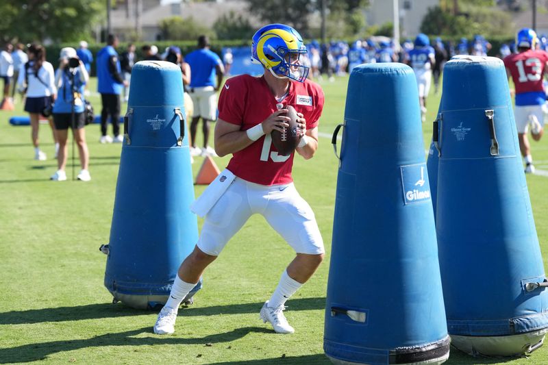 Jul 31, 2026; Westchester California USA; Los Angeles Rams quarterback Ty Simpson (15) throws the ball at training camp at Loyola Marymount University. Mandatory Credit: Kirby Lee-Imagn Images