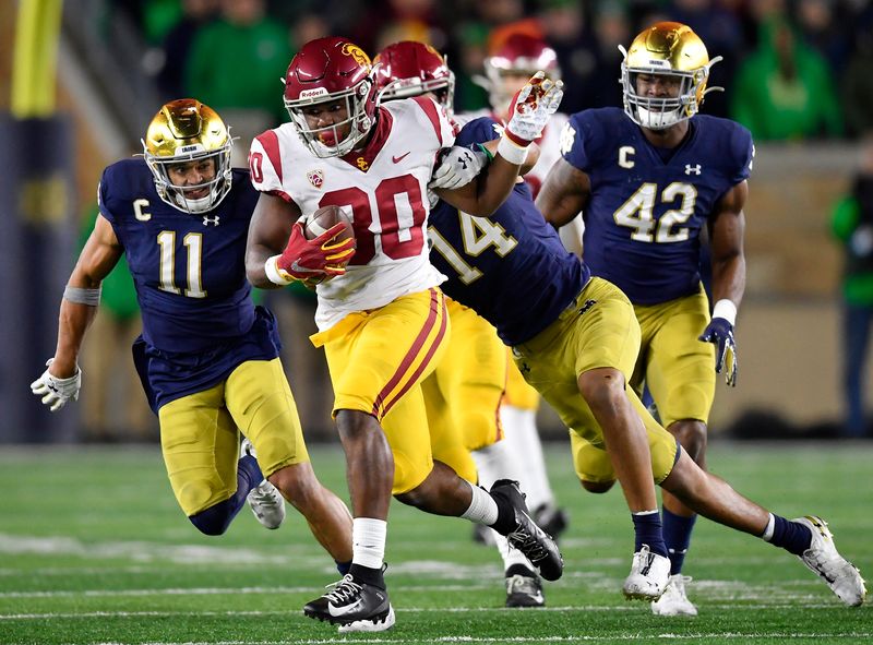 Oct 12, 2019; South Bend, IN, USA; USC Trojans running back Markese Stepp (30) runs with the football in the second half against the Notre Dame Fighting Irish at Notre Dame Stadium. Mandatory Credit: Quinn Harris-USA TODAY Sports