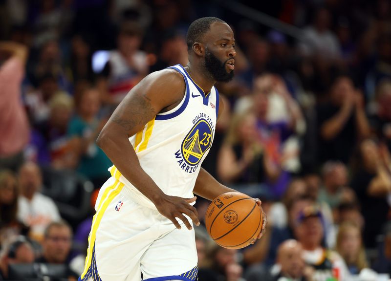 Apr 17, 2026; Phoenix, Arizona, USA; Golden State Warriors forward Draymond Green (23) against the Phoenix Suns during the play-in rounds of the 2026 NBA Playoffs at Mortgage Matchup Center. Mandatory Credit: Mark J. Rebilas-Imagn Images
