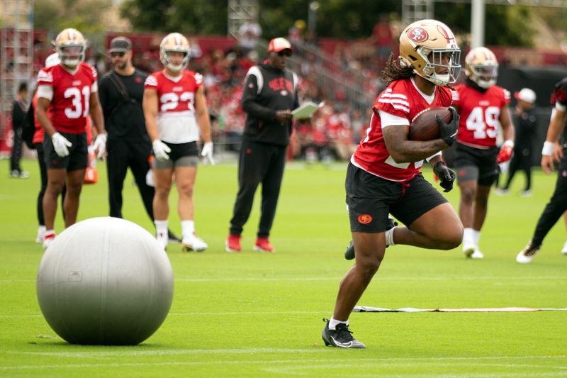 Jul 24, 2025; Santa Clara, CA, USA; San Francisco 49ers running back Jordan James (29) runs through an obstacle course during the second day of training camp. Mandatory Credit: D. Ross Cameron-Imagn Images