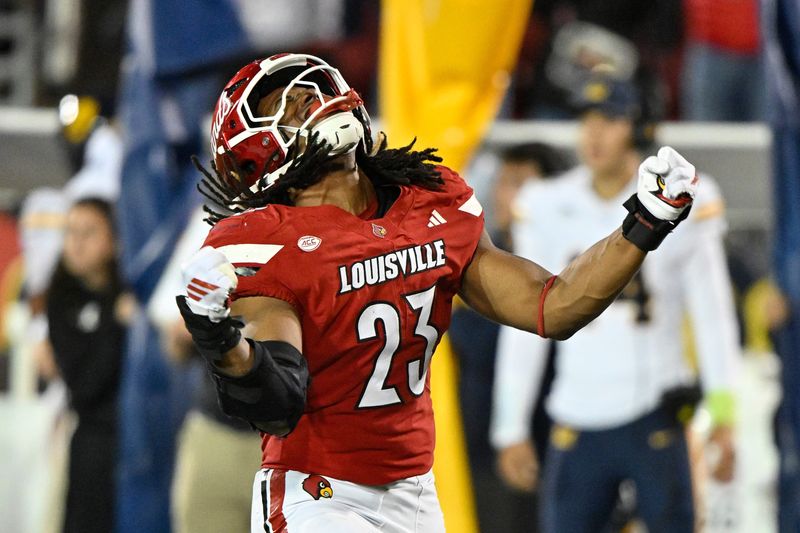 Nov 8, 2025; Louisville, Kentucky, USA;  Louisville Cardinals defensive lineman Wesley Bailey (23) reacts after sacking California Golden Bears quarterback Jaron-Keawe Sagapolutele (3) during the second half at L&N Federal Credit Union Stadium. California defeated Louisville 29-26. Mandatory Credit: Jamie Rhodes-Imagn Images