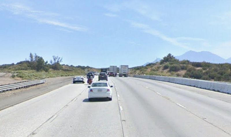 The southbound 15 Freeway, just south of Oak Hills Road, at the Cajon Pass in San Bernardino County.