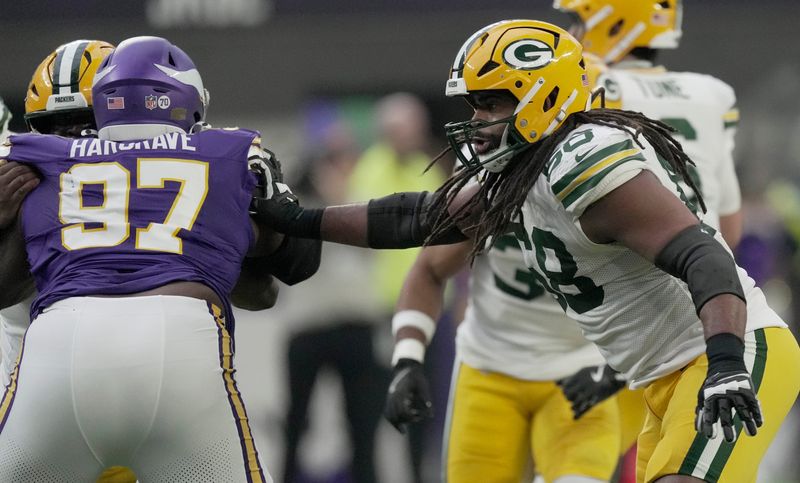 Green Bay Packers guard Lecitus Smith (68) is shown during the third quarter of their game against the Minnesota Vikings Sunday, January 4, 2026 at U.S. Bank Stadium in Minneapolis, Minnesota.