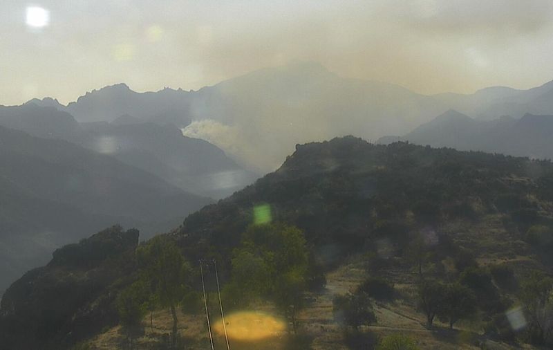 Camera show smoke from the Buena Fire burning off Yerba Buena Road in Ventura County on Aug. 7, 2026.