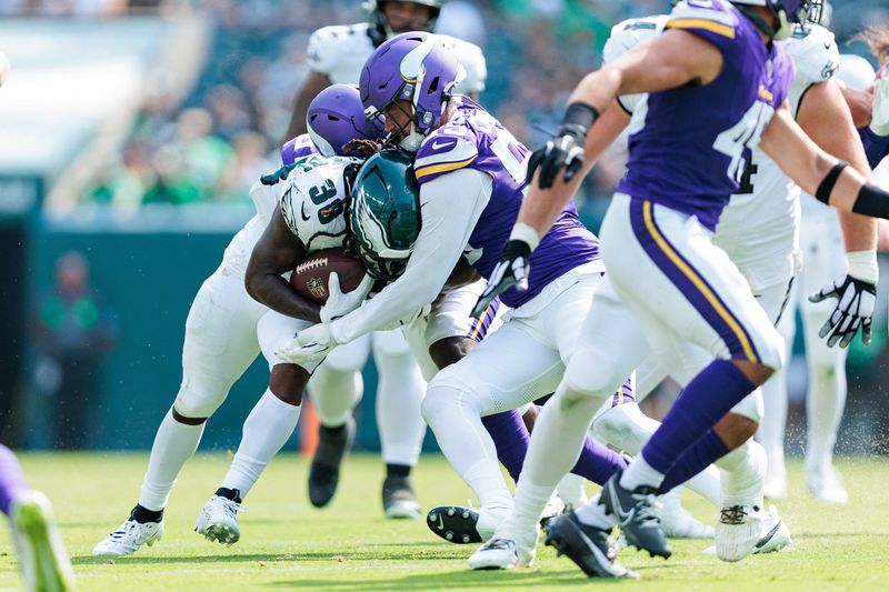 Aug 24, 2024; Philadelphia, Pennsylvania, USA; Philadelphia Eagles running back Lew Nichols (38) runs the ball against Minnesota Vikings linebacker Andre Carter II (55) during the fourth quarter at Lincoln Financial Field. Mandatory Credit: Caean Couto-USA TODAY Sports