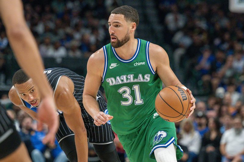 Apr 3, 2026; Dallas, Texas, USA; Dallas Mavericks guard Klay Thompson (31) brings the ball up court during the game between the Mavericks and the Magic at American Airlines Center. Mandatory Credit: Jerome Miron-Imagn Images