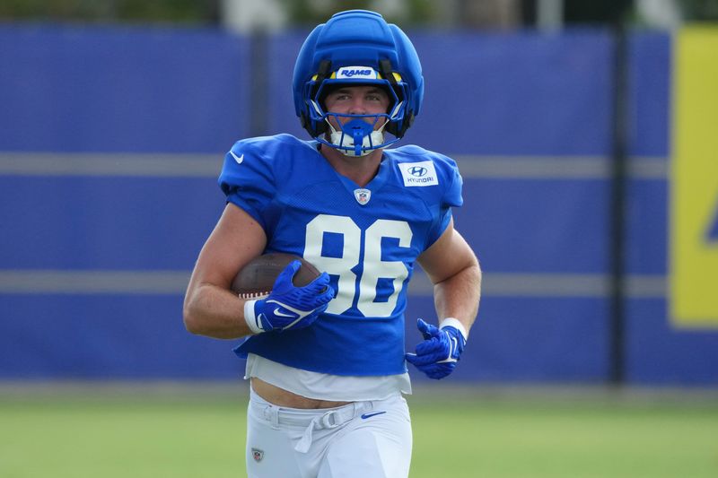 Aug 11, 2026; Woodland Hills, CA, USA; Los Angeles Rams tight end Max Klare (86) carries the ball against the Dallas Cowboys during a joint practice at the Rams Practice Facility. Mandatory Credit: Kirby Lee-Imagn Images