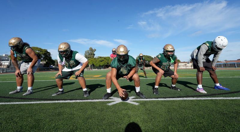 The St. Bonaventure offensive line gets ready to run a play during a practice on Aug. 13, 2026, at St. Bonaventure High.