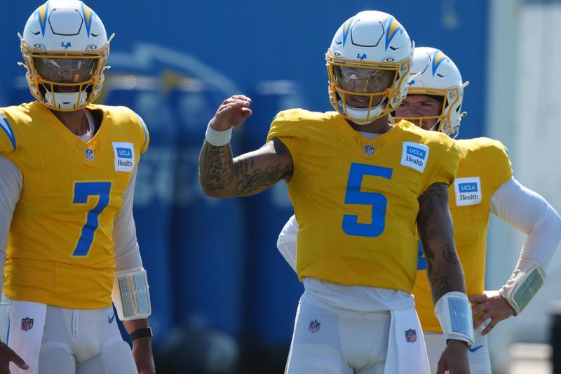 Aug 7, 2025; El Segundo, CA, USA; Los Angeles Chargers quarterbacks DJ Uigaleilei (7) and Trey Lance (5) during training camp at The Bolt. Mandatory Credit: Kirby Lee-Imagn Images