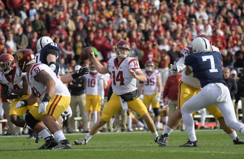 Jan 2, 2017; Pasadena, CA, USA; USC Trojans quarterback Sam Darnold (14) throws a pass against the Penn State Nittany Lions during the 103rd Rose Bowl at Rose Bowl. USC defeated Penn State 52-49 in the highest scoring game in Rose Bowl history. Mandatory Credit: Kirby Lee-USA TODAY Sports