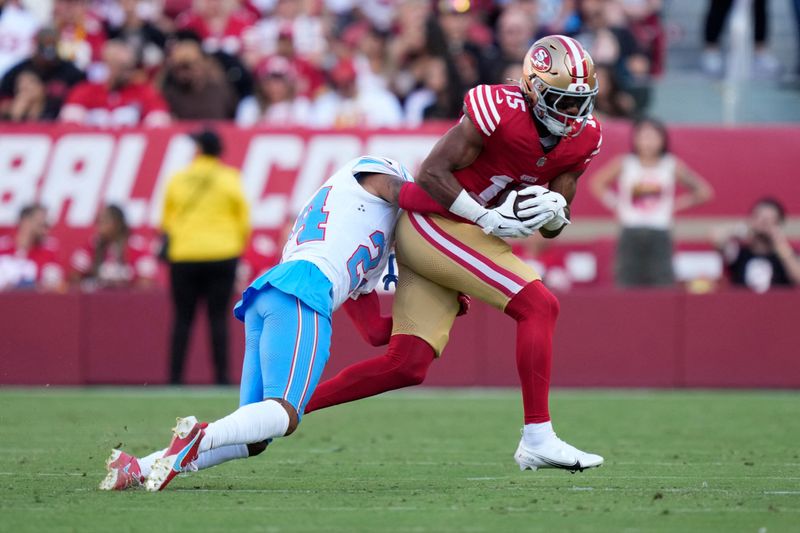 August 13, 2026; Santa Clara, California, USA; San Francisco 49ers wide receiver De'zhaun Stribling (15) is tackled by Tennessee Titans cornerback Alontae Taylor (24) during the first quarter at Levi's Stadium. Mandatory Credit: Kyle Terada-Imagn Images