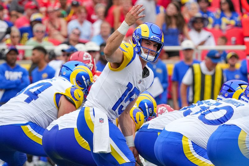 Aug 15, 2026; Kansas City, Missouri, USA; Los Angeles Rams quarterback Ty Simpson (15) signals at the line against the Kansas City Chiefs during the first half of the pre season game at Arrowhead Stadium. Mandatory Credit: Denny Medley-Imagn Images