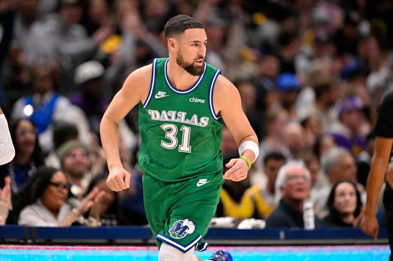 Jan 24, 2026; Dallas, Texas, USA; Dallas Mavericks guard Klay Thompson (31) runs back up the court against the Los Angeles Lakers during the game at the American Airlines Center. Mandatory Credit: Jerome Miron-Imagn Images