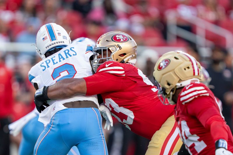 August 13, 2026; Santa Clara, California, USA; San Francisco 49ers defensive tackle Gracen Halton (93) tackles Tennessee Titans running back Tyjae Spears (2) during the second quarter at Levi's Stadium. Mandatory Credit: Kyle Terada-Imagn Images