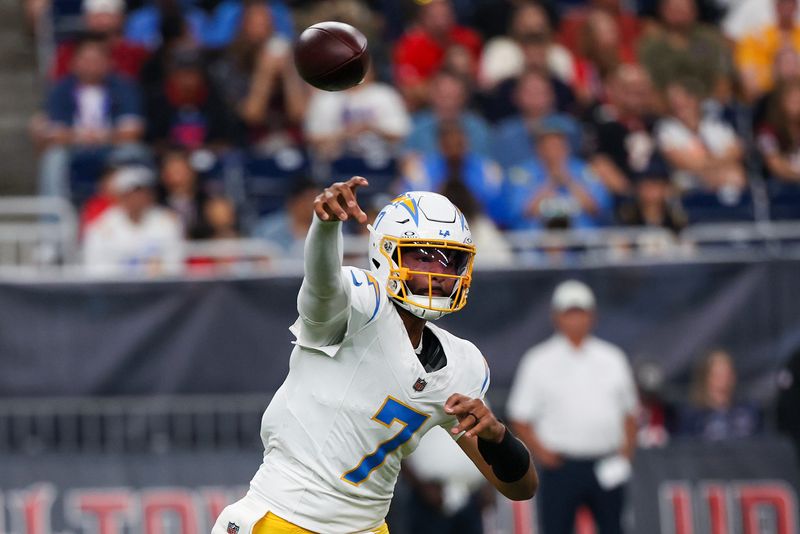 Aug 13, 2026; Houston, Texas, USA;  Los Angeles Chargers quarterback DJ Uiagalelei (7) passes against the Houston Texans in the second half  at Reliant Stadium. Mandatory Credit: Thomas Shea-Imagn Images