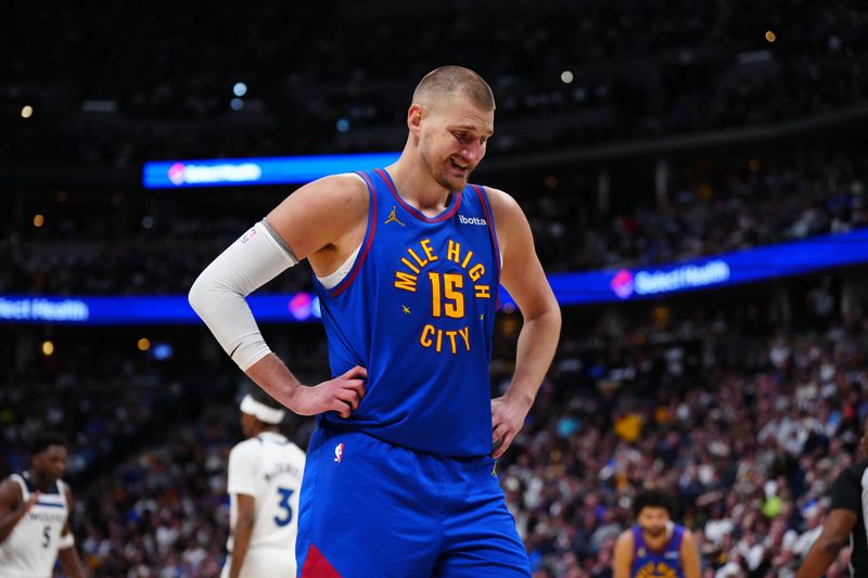 Apr 20, 2026; Denver, Colorado, USA; Denver Nuggets center Nikola Jokic (15) reacts in the second quarter against the Minnesota Timberwolves  during game two of the first round of the 2026 NBA Playoffs at Ball Arena. Mandatory Credit: Ron Chenoy-Imagn Images
