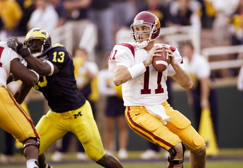 Jan 1, 2004; Pasadena, CA, USA: FILE PHOTO; Southern California Trojans quarterback Matt Leinart (11) in action against the Michigan Wolverines during the 2004 Rose Bowl at the Rose Bowl. The Trojans defeated the Wolverines 28-14. Mandatory Credit: Richard Mackson-USA TODAY Network