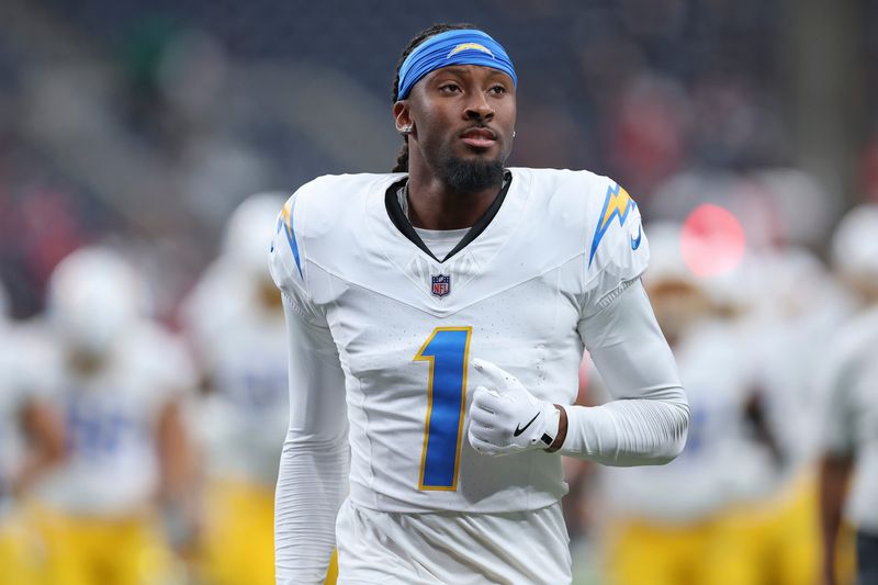 Aug 13, 2026; Houston, Texas, USA;  Los Angeles Chargers wide receiver Quentin Johnston (1) before the game against the Houston Texans at Reliant Stadium. Mandatory Credit: Troy Taormina-Imagn Images