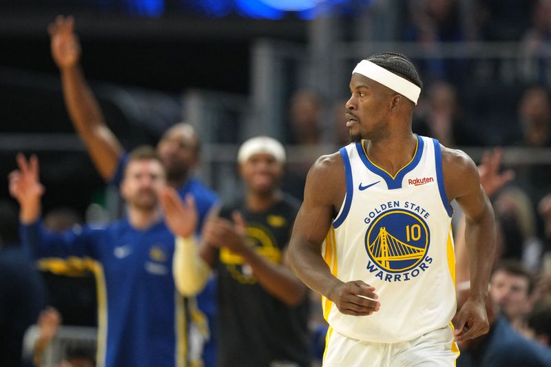 Dec 25, 2025; San Francisco, California, USA; Golden State Warriors forward Jimmy Butler III (10) reacts after making a three point basket against the Dallas Mavericks during the second quarter at Chase Center. Mandatory Credit: Darren Yamashita-Imagn Images
