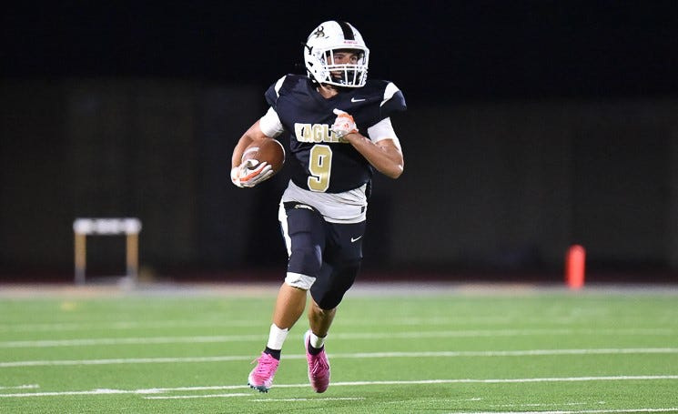 Oak Park's Nevada Ford finds some room to run during the Eagles' 62-13 win over Angelou Community in a nonleague season opener on Friday, Aug. 21, 2026, at Oak Park High.