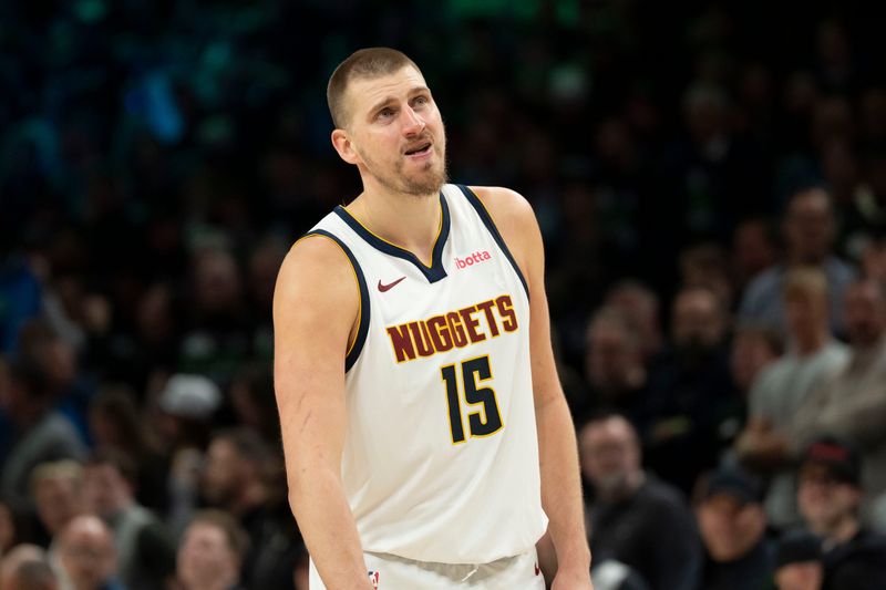 Apr 30, 2026; Minneapolis, Minnesota, USA; Denver Nuggets center Nikola Jokic (15) looks on against the Minnesota Timberwolves in the second half during game six of the first round of the 2026 NBA Playoffs at Target Center. Mandatory Credit: Jesse Johnson-Imagn Images