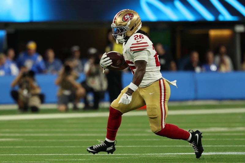 Aug 20, 2026; Inglewood, California, USA;  San Francisco 49ers running back Kaelon Black (26) runs with the ball during the first quarter against the Los Angeles Chargers at SoFi Stadium. Mandatory Credit: Kiyoshi Mio-Imagn Images