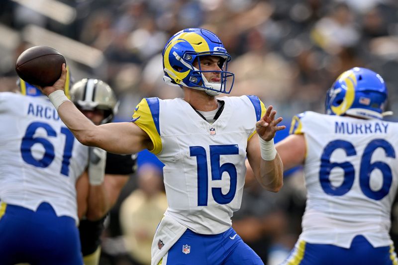 Aug 22, 2026; Inglewood, California, USA;  Los Angeles Rams quarterback Ty Simpson (15) throws  pass during the fourth quarter against the New Orleans Saints at SoFi Stadium.  Mandatory Credit: Griffin Hooper-Imagn Images