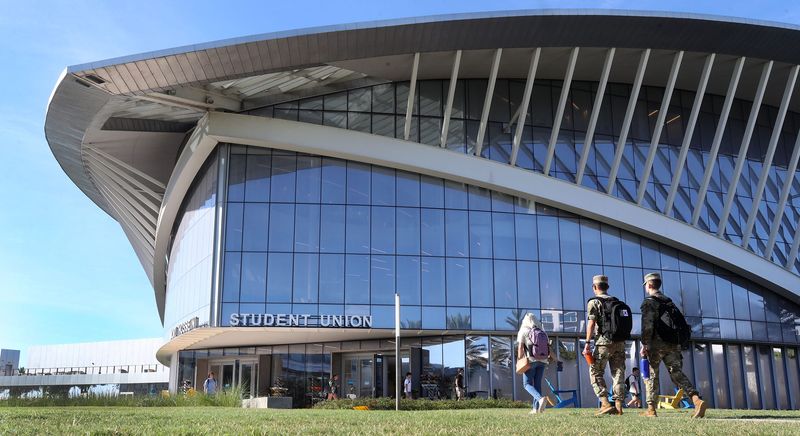 Embry-Riddle Aeronautical University students head toward the Mori Hosseini Student Union on the Daytona Beach campus in 2022.