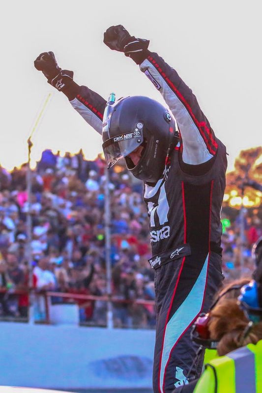 Kyle Busch celebrates after winning the 50th Snowball Derby at Five Flags Speedway on Sunday, Dec. 3, 2017. He also won it in 2009.