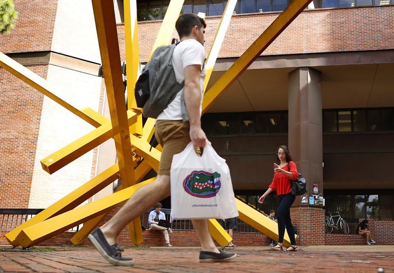 Students walk around the University of Florida campus on the first day of fall classes in Gainesville.