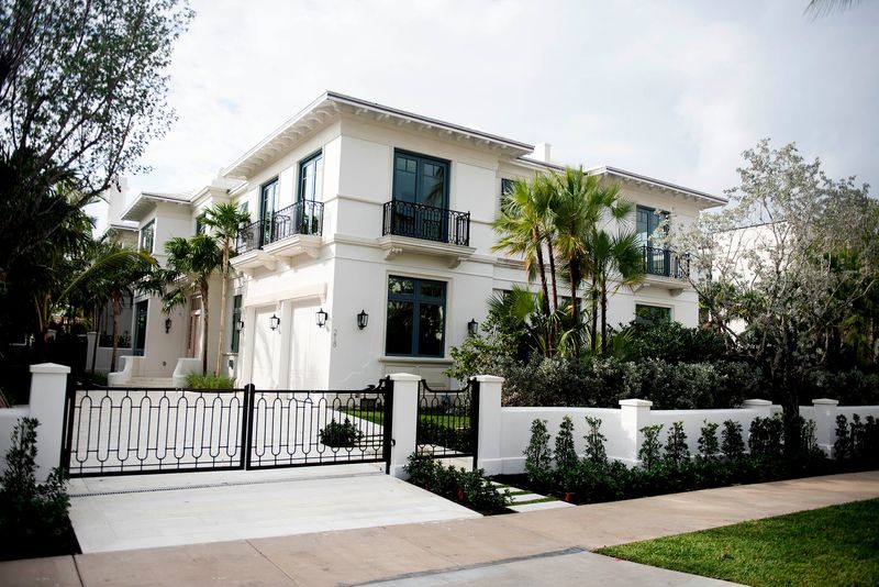 Stephanie and Bennie Bray have sold the four-bedroom townhouse they owned through a family trust at 218 Brazilian Ave. in Midtown Palm Beach. The townhouse is on the left side of the duplex building.