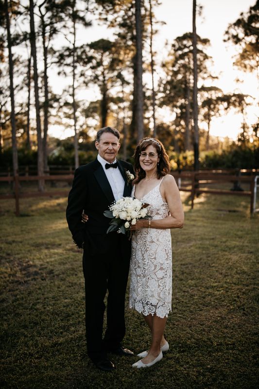 Janet Alessi and Otis on their wedding day: Their match began because he was tall enough and she lived close enough and match.com thought they could be compatible.